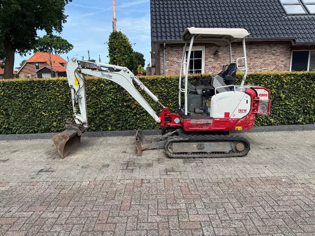 Takeuchi tb216 hybride met sorteer grijper