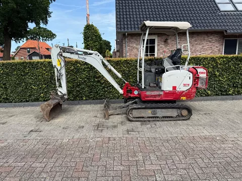 Takeuchi tb216 hybride met sorteer grijper Takeuchi tb216 hybride met sorteer grijper